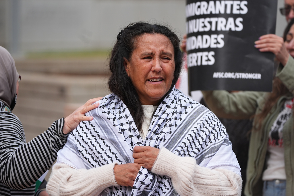 Immigrant-rights activist Jeanette Vizguerra speaks after she was released on bond following nine months in an immigration detention center as supporters staged a rally for her outside the federal courthouse Tuesday, Dec. 23, 2025, in Denver. (AP Photo/David Zalubowski)