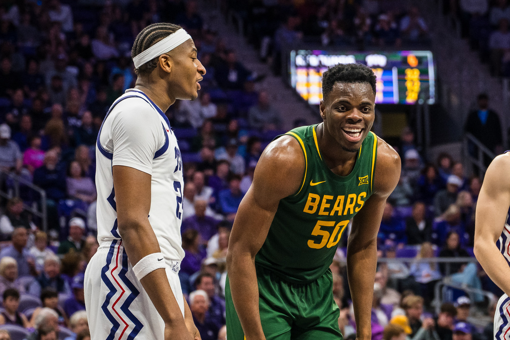 Baylor center James Nnaji (50) and Texas Christian University forward Xavier Edmonds (left) laugh during an NCAA college basketball game, Saturday, Jan. 3, 2026, Fort Worth, Texas. (AP Photo/Jessica Tobias)