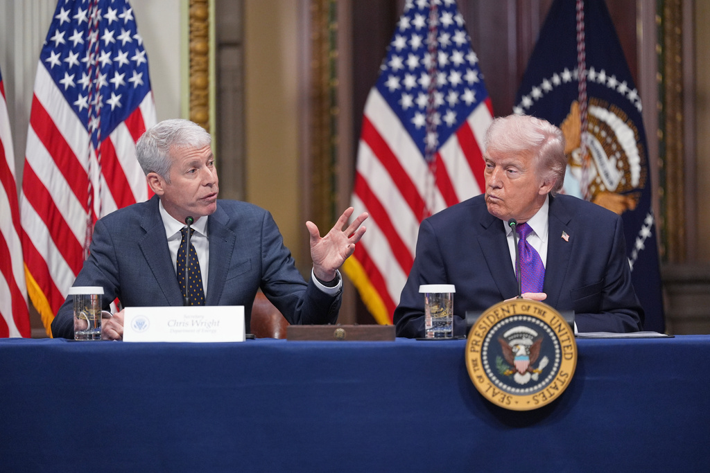 Energy Secretary Chris Wright, left, speaks as President Donald Trump listens during an event about the Ratepayer Protection Pledge, in the Indian Treaty Room of the Eisenhower Executive Office Building on the White House complex, Wednesday, March 4, 2026, in Washington. (AP Photo/Jacquelyn Martin)