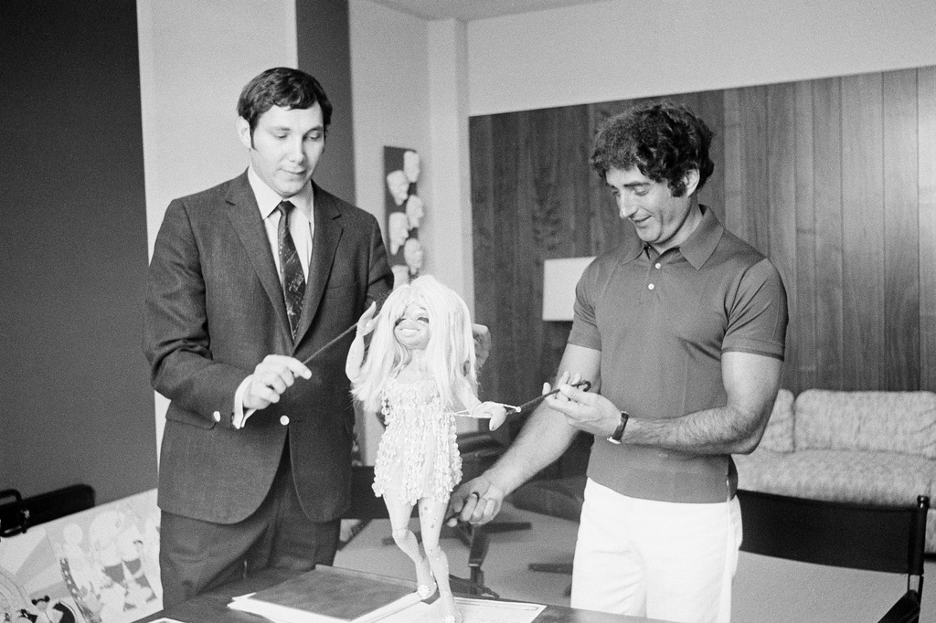 FILE - Sid Krofft, right, and his brother Marty Krofft appear with the puppet "Collette," developed for "The Dean Martin Show," appear in Los Angeles on Aug. 27, 1968. (AP Photo/Harold Filan, File)