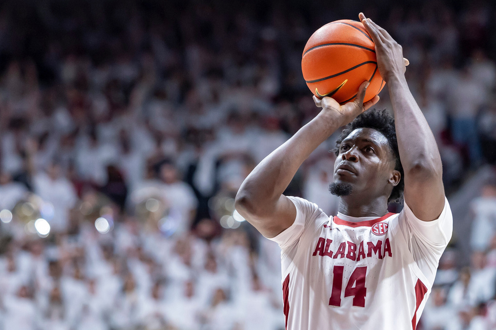 FILE - Alabama center Charles Bediako (14) shoots a free throw against Tennessee during the second half of an NCAA college basketball game Saturday, Jan. 24, 2026, in Tuscaloosa, Ala. (AP Photo/Vasha Hunt, File)