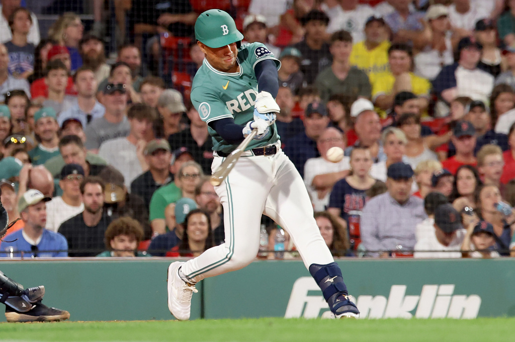 Boston Red Sox's Jahmai Jones hits the ball during the eighth inning of the second baseball game of a doubleheader against the Tampa Bay Rays, Friday, July 17, 2026, in Boston. (AP Photo/Mark Stockwell)