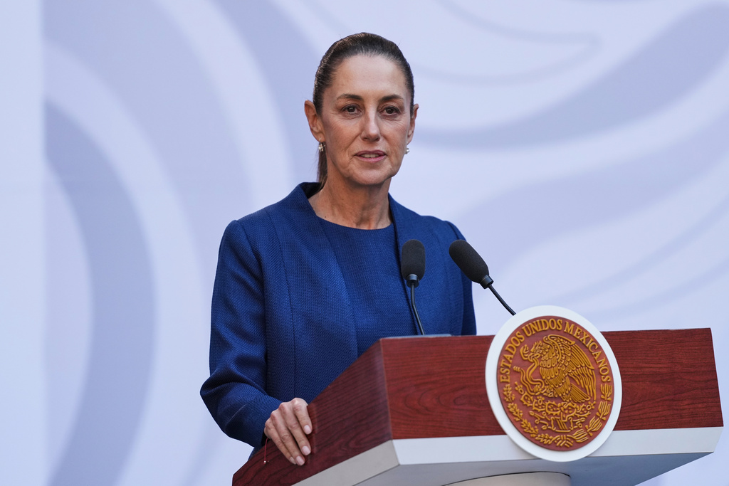 FILE - Mexican President Claudia Sheinbaum presents a new security strategy against violence for Michoacan state, at the National Palace, in Mexico City, Nov. 9, 2025. (AP Photo/Claudia Rosel, File)