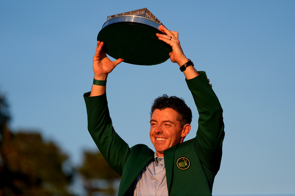 Rory McIlroy, of Northern Ireland, holds the trophy after winning the Masters golf tournament at the Augusta National Golf Club, Sunday, April 12, 2026, in Augusta, Ga.(AP Photo/Ashley Landis)