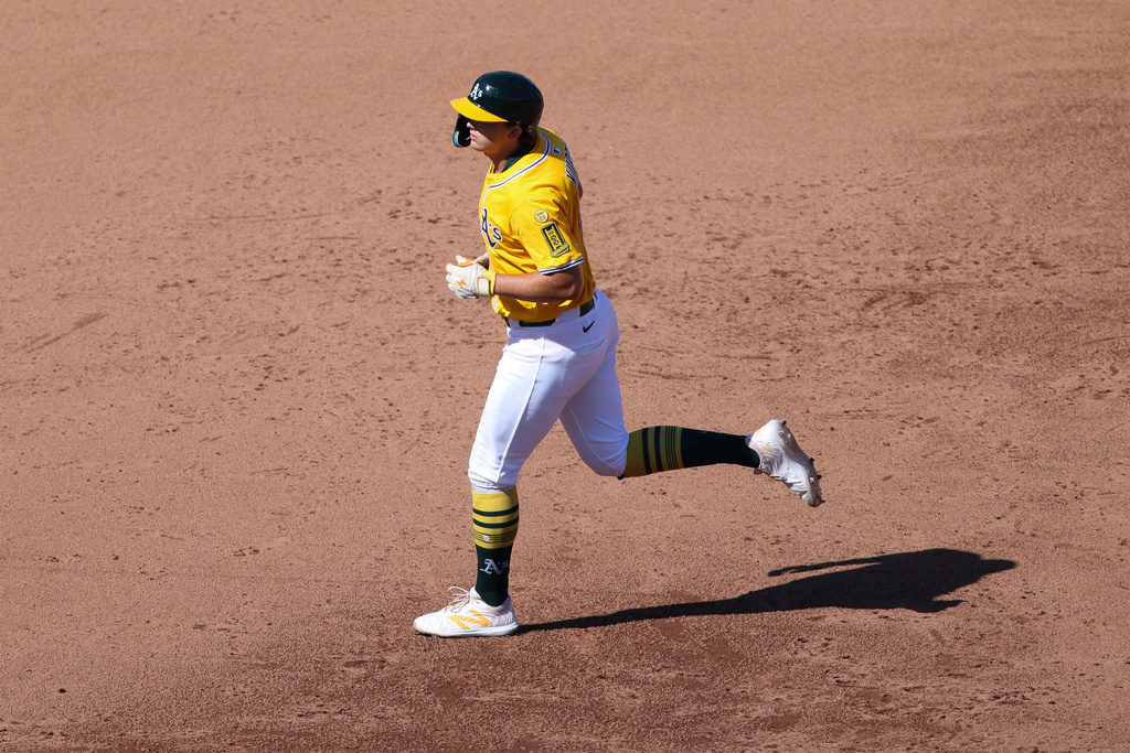 Athletics' Nick Kurtz jogs around the bases after hitting a solo home run during the sixth inning of a baseball game against the Houston Astros, Thursday, Sept. 25, 2025, in West Sacramento, Calif. (AP Photo/Scott Marshall)
