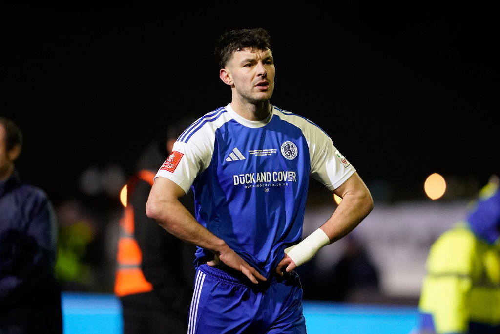 Macclesfield's Sam Heathcote walks off the pitch after the English FA cup fourth round soccer match between Macclesfield and Brentford in Macclesfield, England, Monday, Feb. 16, 2026. (AP Photo/Dave Thompson)