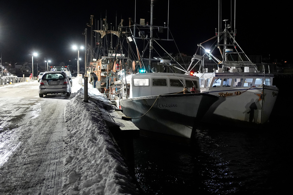 Fishing boats are tied up in Gloucester, Mass., the home port of a vessel that that went missing at sea with seven people aboard, Friday, Jan. 30, 2026. (AP Photo/Robert F. Bukaty)