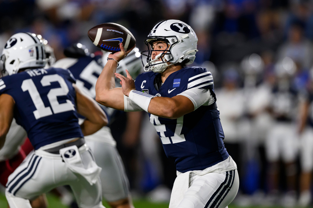 BYU quarterback Bear Bachmeier (47) looks to pass the ball during the first half of an NCAA college football game against Iowa State, Friday, Oct. 9, 2026, in Provo, Utah. (AP Photo/Tyler Tate)