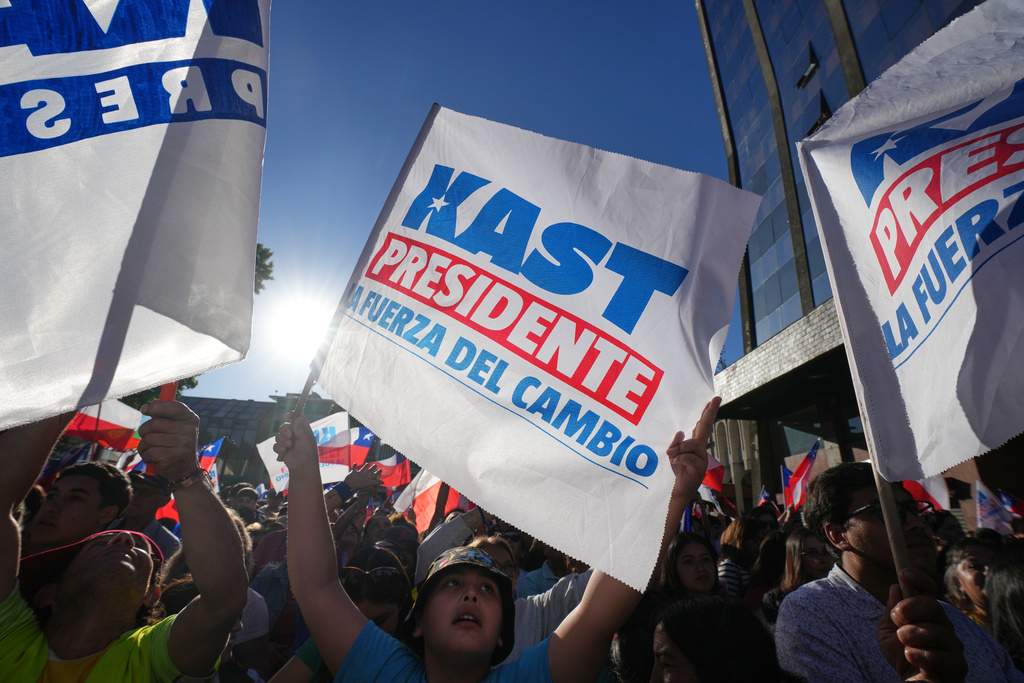 Supporters of presidential candidate Jose Antonio Kast, of the Republican Party, attend a rally ahead of the presidential runoff election in Temuco, Chile, Thursday, Dec. 11, 2025. (AP Photo/Esteban Felix)