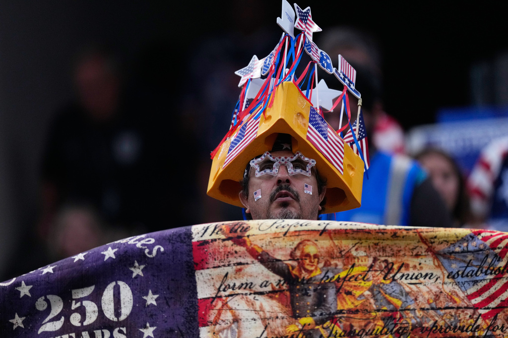 A fan of the United States waits for the start of a World Cup Group D soccer match between Turkey and the United States in Inglewood, Calif., near Los Angeles, Thursday, June 25, 2026. (AP Photo/Mark J. Terrill)