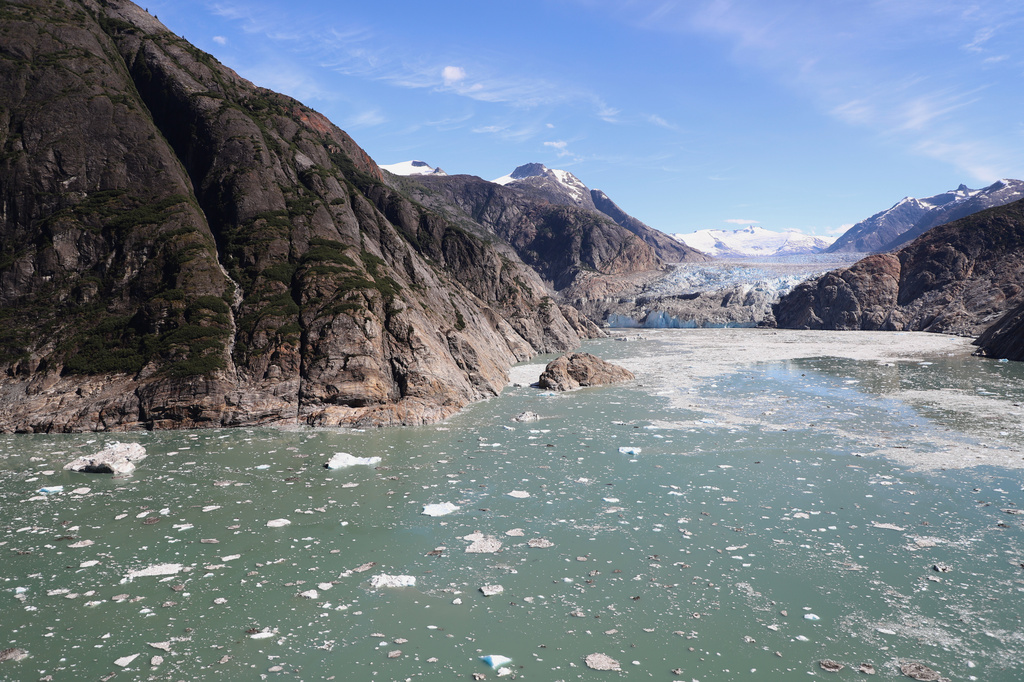 This photo provided by the U.S. Geological Survey looks up Tracy Arm fjord to the terminus of the South Sawyer Glacier about 80 miles southeast of Juneau, Alaska, on Aug. 13, 2025, days after a landslide in the area. (John Lyons/U.S. Geological Survey via AP)