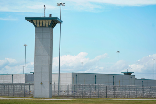 FILE - The federal prison complex in Terre Haute, Ind., is shown Aug. 28, 2020. (AP Photo/Michael Conroy, File) FILE - The federal prison complex in Terre Haute, Ind., is shown Aug. 28, 2020. (AP Photo/Michael Conroy, File)