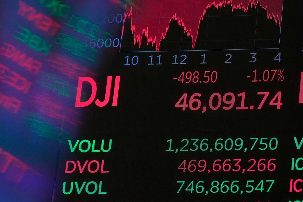 A board above the trading floor of the New York Stock Exchange displays the closing number for the Dow Jones industrial average, Tuesday, Nov. 18, 2025. (AP Photo/Richard Drew)