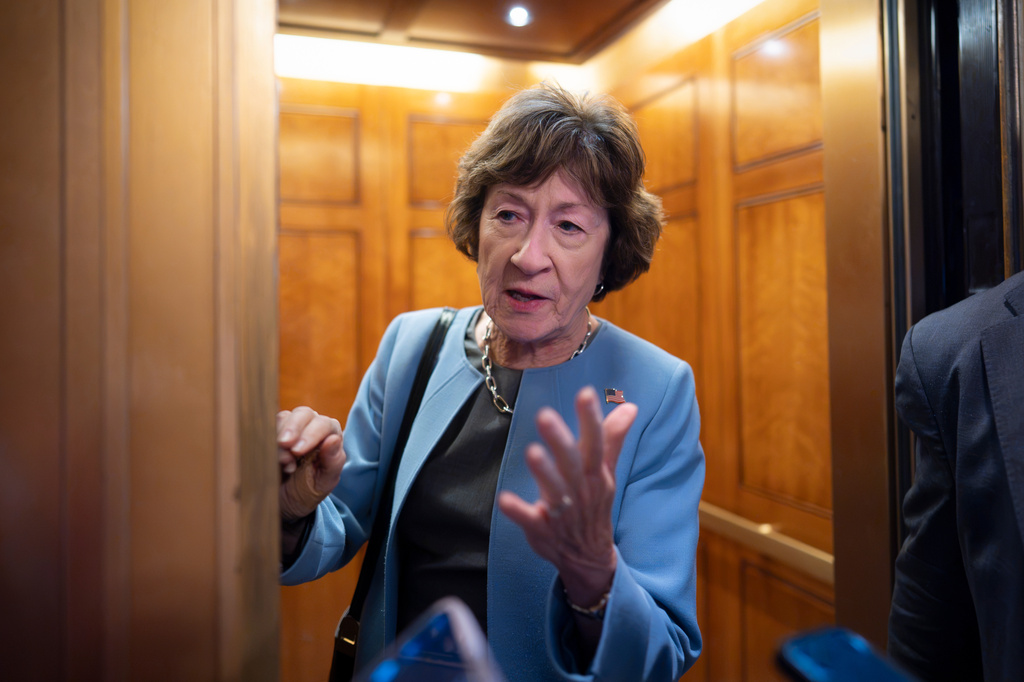 Sen. Susan Collins, R-Maine, responds to reporters about the confirmation hearing for Heidi Overton, President Donald Trump's pick to lead the Food and Drug Administration, at the Capitol in Washington, Thursday, Sept. 24, 2026. (AP Photo/J. Scott Applewhite)