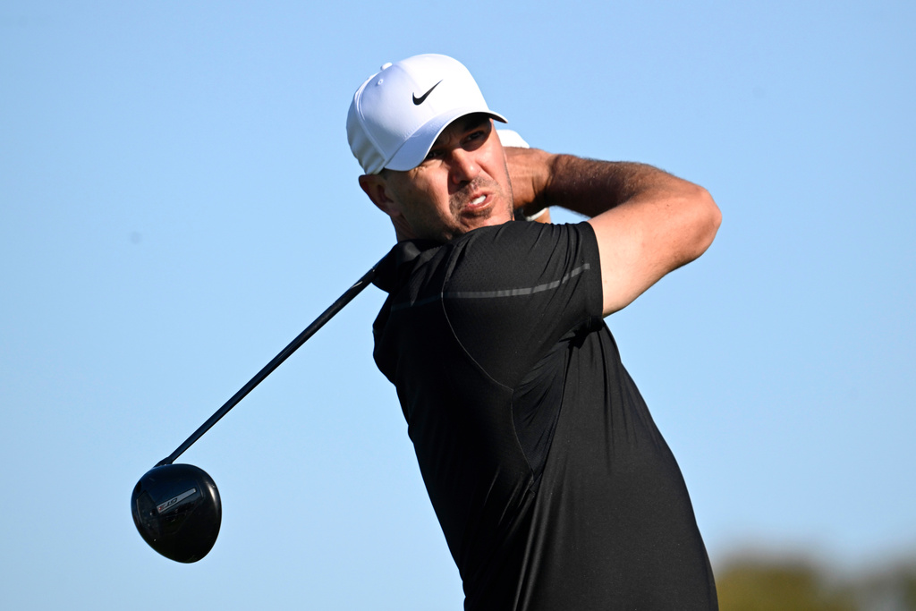 Brooks Koepka tees off on the second hole on the South Course at Torrey Pines during the first round of the Farmers Insurance Open golf tournament Thursday, Jan. 29, 2026, in San Diego. (AP Photo/Denis Poroy)