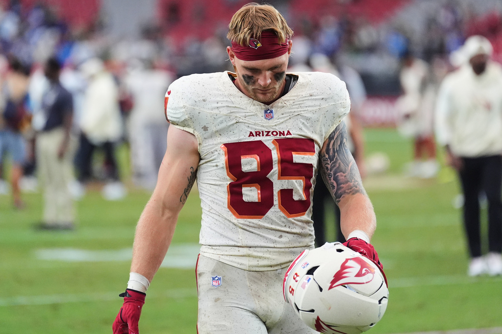 Arizona Cardinals tight end Trey McBride walks off the field after a loss to the Seattle Seahawks in an NFL football game in Glendale, Ariz., Sunday, Sept. 20, 2026. (AP Photo/Ross D. Franklin)