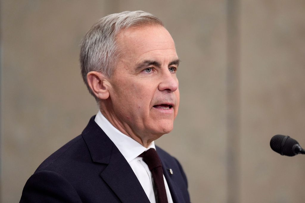 Canada's Prime Minister Mark Carney is seen during an news conference in Ottawa, Ontario, Wednesday, Nov. 26, 2025. (Adrian Wyld/The Canadian Press via AP)