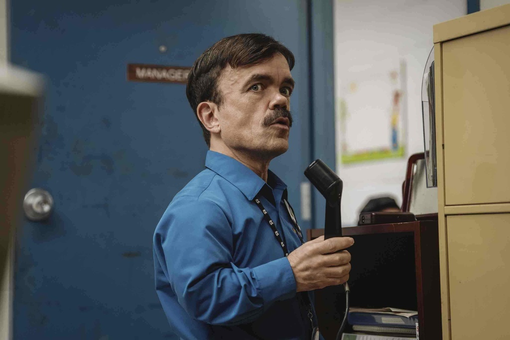 This image released by Paramount Pictures shows Peter Dinklage in a scene from "Roofman." (Davi Russo/Paramount Pictures via AP)