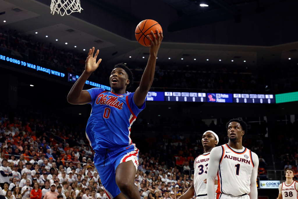 Mississippi forward Malik Dia (0) goes for a layup against Auburn during the first half of an NCAA college basketball game Saturday, Feb. 28, 2026, in Auburn, Ala. (AP Photo/Butch Dill)