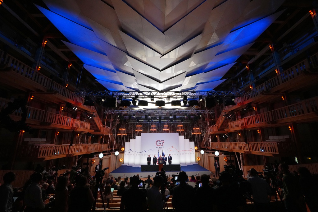 U.S. President Donald Trump, center, speaks as he is flanked by, from left, U.S Trade Representative Jamieson Greer, U.S. Secretary of Commerce Howard Lutnick, United States Secretary of State Marco Rubio and U.S. Treasury Secretary Scott Bessent during a media conference at the end of the G7 summit in Evian-les-Bains, France, Wednesday, June 17, 2026. (AP Photo/Vadim Ghirda)