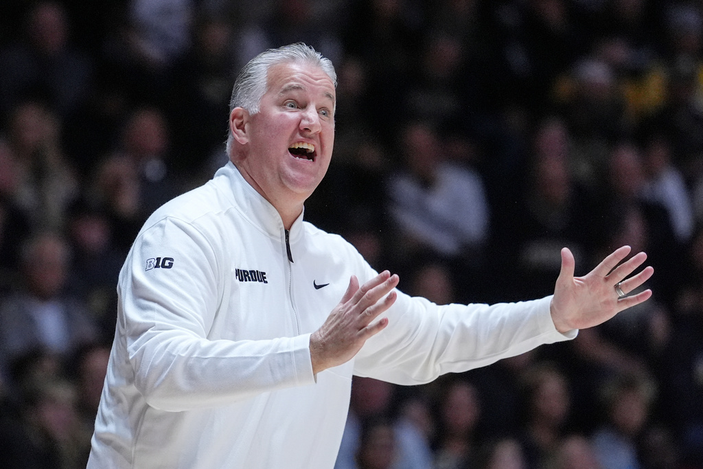 FILE - Purdue head coach Matt Painter gestures during the first half of an NCAA college basketball game against Alabama in West Lafayette, Ind., Friday, Nov. 15, 2024. (AP Photo/Michael Conroy, File)