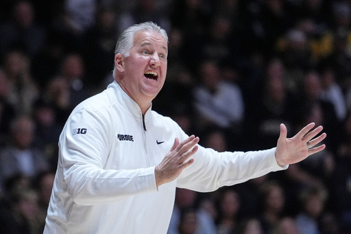 FILE - Purdue head coach Matt Painter gestures during the first half of an NCAA college basketball game against Alabama in West Lafayette, Ind., Friday, Nov. 15, 2024. (AP Photo/Michael Conroy, File) FILE - Purdue head coach Matt Painter gestures during the first half of an NCAA college basketball game against Alabama in West Lafayette, Ind., Friday, Nov. 15, 2024. (AP Photo/Michael Conroy, File)