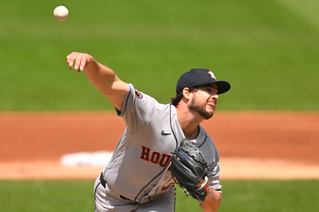 Houston Astros pitcher Peter Lambert delivers in the first inning of a baseball game against the Cleveland Guardians in Cleveland, Wednesday, April 22, 2026. (AP Photo/David Richard)