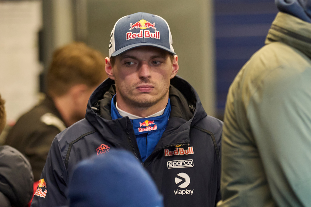 Max Verstappen stands in his pit before the start of a pit stop and observes the work during the Nurburgring 24-hour auto race in Nurburg, Germany, Sunday, May 17, 2026. (Thomas Frey/dpa via AP)