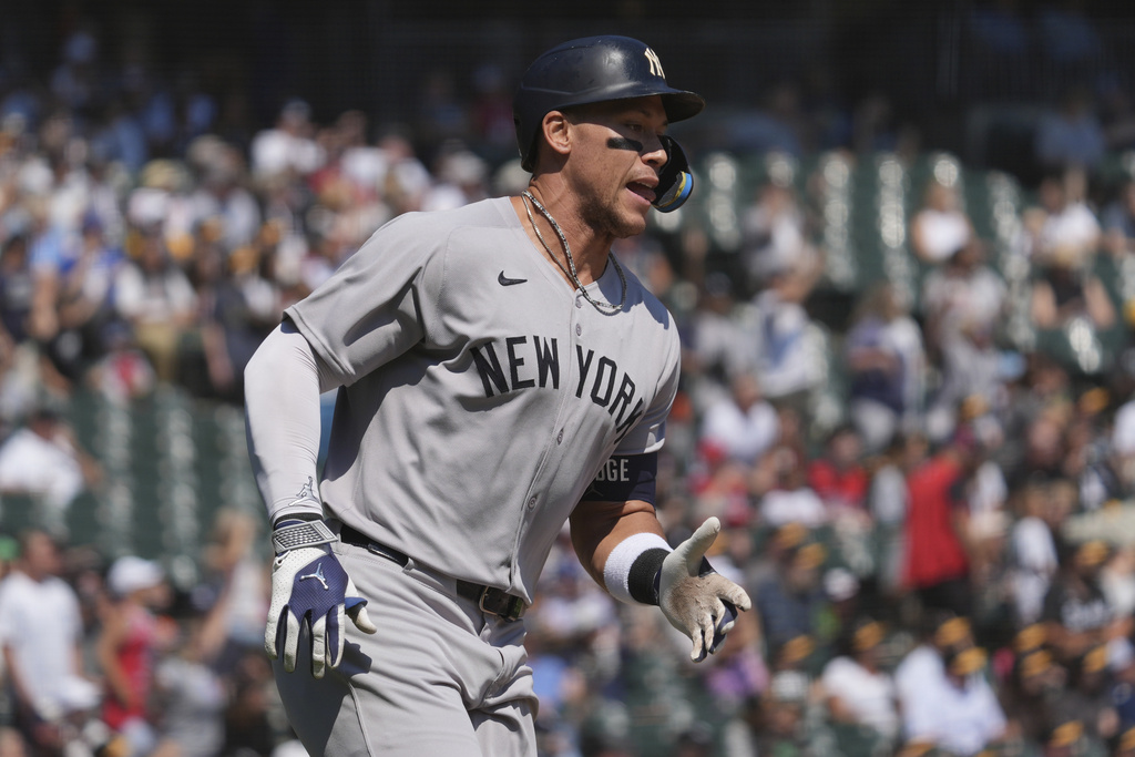 New York Yankees' Aaron Judge rounds the bases after hitting a solo home run during the first inning of a baseball game against the Chicago White Sox in Chicago, Sunday, Aug. 31, 2025. (AP Photo/Nam Y. Huh)