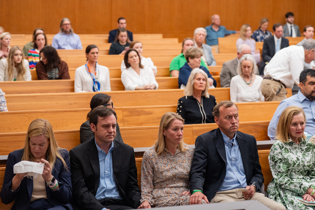The Eastland family sits together as they attend a hearing on a suit against Camp Mystic in the 459th State District Court in Austin, Wednesday, April 15, 2026. (Mikala Compton/Austin American-Statesman via AP) /Austin American-Statesman via AP)