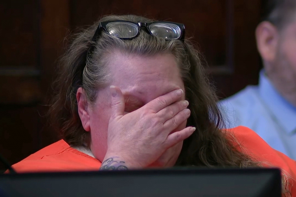 In this photo taken from video provided by WCHS-TV, Julie Miller is shown at her sentencing Wednesday, Feb. 25, 2026, in Madison, W.Va. (WCHS-TV via AP)