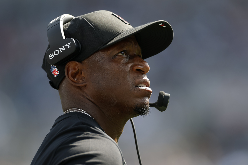 Atlanta Falcons head coach Raheem Morris watches during the second half of an NFL football game against the Carolina Panthers, Sunday, Sept. 21, 2025, in Charlotte, N.C. (AP Photo/Rusty Jones)