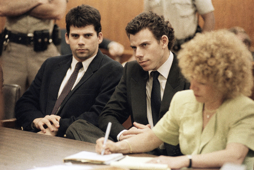 FILE - Lyle, left, and Erik Galen Menendez sit in a courtroom in Beverly Hills, Calif., May 14, 1990. (AP Photo/Kevork Djansezian, File)