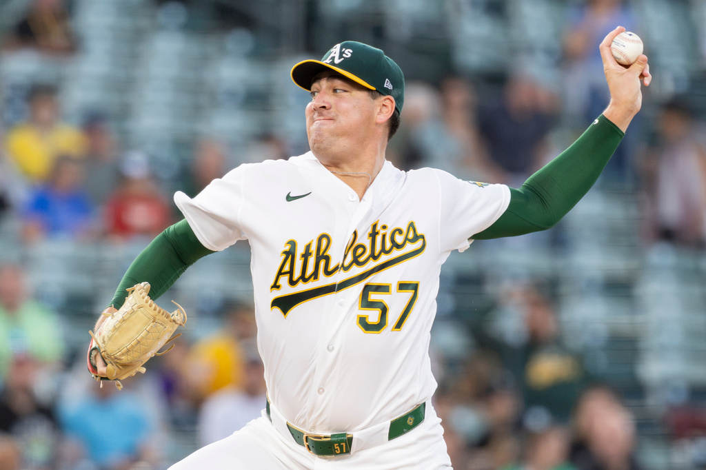 Athletics pitcher Jacob Lopez throws to the Houston Astros during the first inning of a baseball game Friday, Sept. 25, 2026, in West Sacramento, Calif. (AP Photo/Sara Nevis)