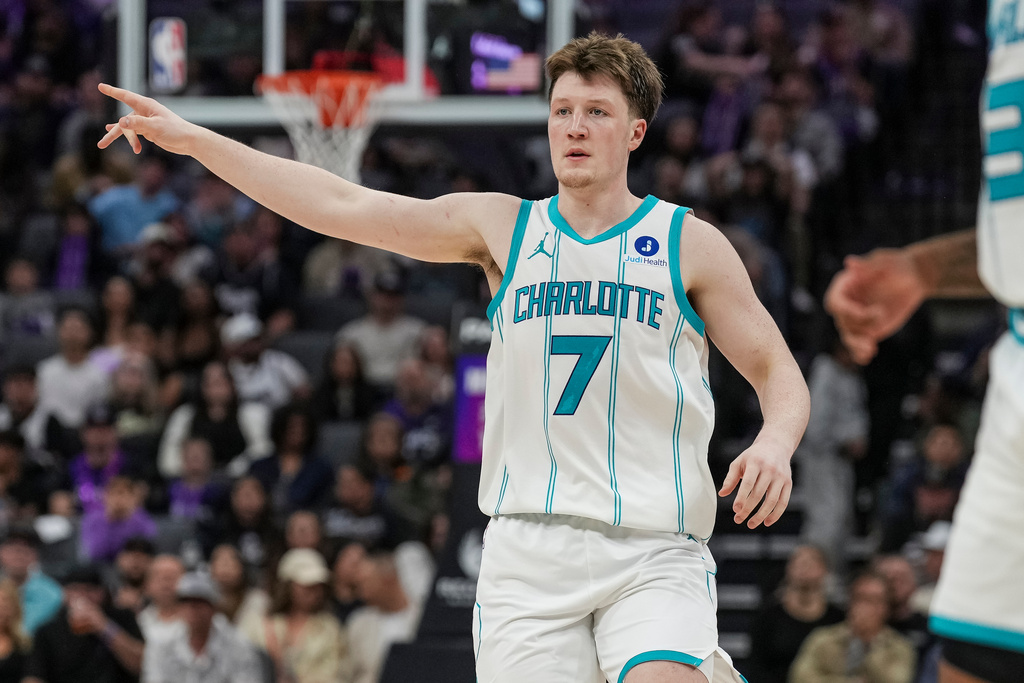 Charlotte Hornets guard Kon Knueppel (7) reacts after a three-point basket during the second half of an NBA basketball game against the Sacramento Kings, Wednesday, March 11, 2026, in Sacramento, Calif. (AP Photo/Justine Willard)