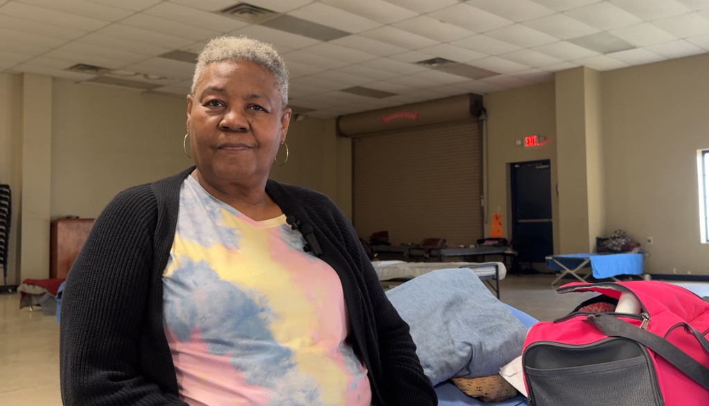 Glyn Alexander sits beside her cot at the Humphreys County warming center in Belzoni, Miss., on Thursday, Jan. 29, 2026. (AP Photo/Sophie Bates)