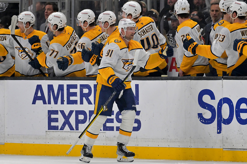 Nashville Predators center Steven Stamkos (91) is congratulated at the bench after scoring a goal during the second period of an NHL hockey game, against the Los Angeles Kings, Thursday, April 2, 2026, in Los Angeles. (AP Photo/Jayne Kamin-Oncea)