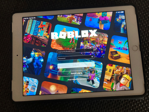 FILE - The gaming platform Roblox is displayed on a tablet, Oct. 30, 2021, in New York. (AP Photo/Leon Keith, File) FILE - The gaming platform Roblox is displayed on a tablet, Oct. 30, 2021, in New York. (AP Photo/Leon Keith, File)