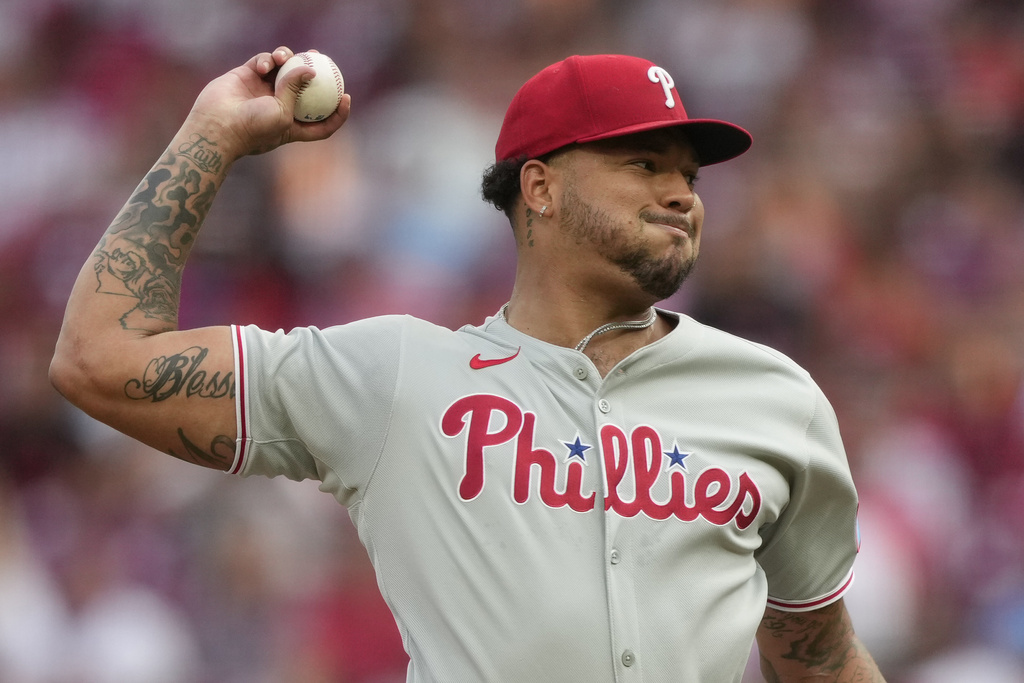 Philadelphia Phillies pitcher Taijuan Walker throws during the fifth inning of a baseball game against the Cincinnati Reds Monday, Aug. 11, 2025, in Cincinnati. (AP Photo/Carolyn Kaster)