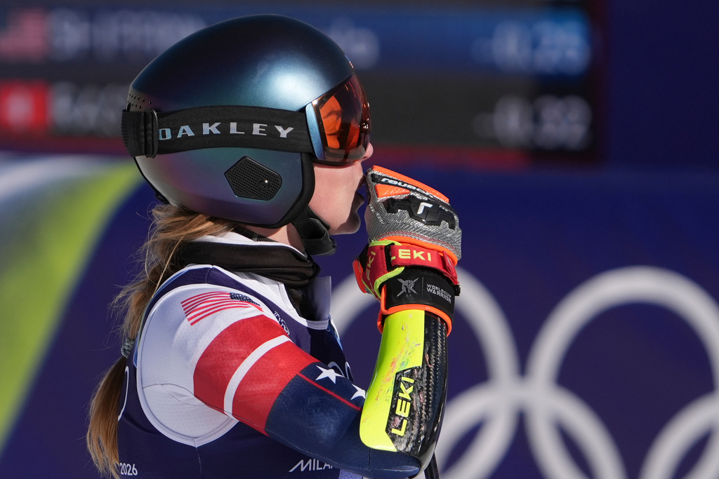 United States' Mikaela Shiffrin at the finish area of an alpine ski, women's giant slalom race, at the 2026 Winter Olympics, in Cortina d'Ampezzo, Italy, Sunday, Feb. 15, 2026. (AP Photo/Jacquelyn Martin)