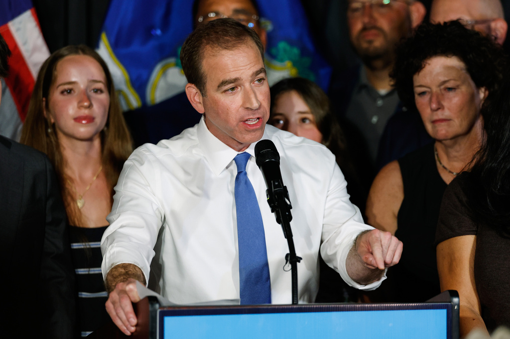 Luke Bronin, former Hartford mayor and Democratic candidate for Connecticut's 1st congressional district, speaks during an election night watch party Tuesday, Aug. 11, 2026, in Hartford, Conn. (AP Photo/Rusty Jones)
