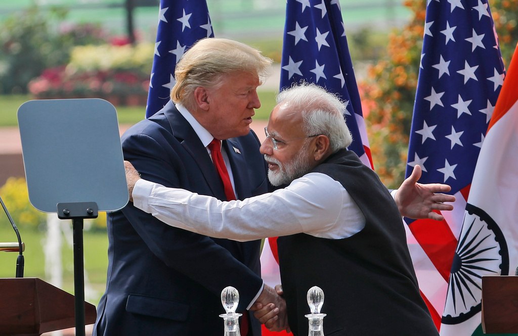 FILE - U.S. President Donald Trump and Indian Prime Minister Narendra Modi embrace after giving a joint statement in New Delhi, India, Feb. 25, 2020. (AP Photo/Manish Swarup, File)