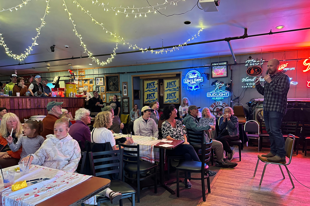 Democratic gubernatorial candidate Jonathan Kreiss-Tomkins, right, speaking at a campaign event on Sunday, July 5, 2026, in Petersburg, Alaska. (AP Photo/Becky Bohrer)