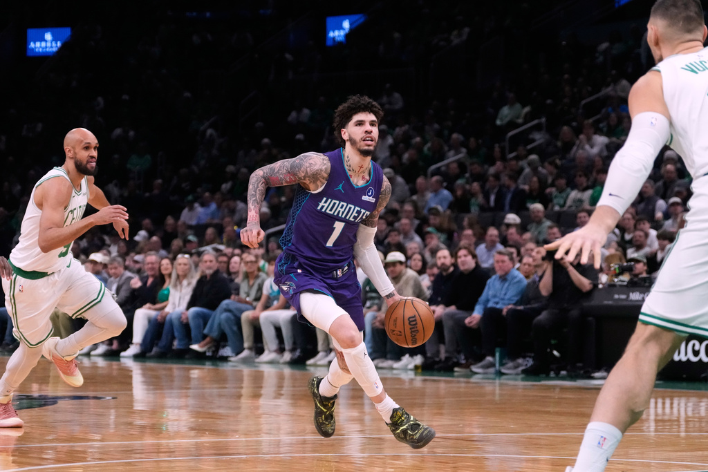 Charlotte Hornets guard LaMelo Ball (1) drives to the basket against the Boston Celtics during the first half of an NBA basketball game, Wednesday, March 4, 2026, in Boston. (AP Photo/Charles Krupa)