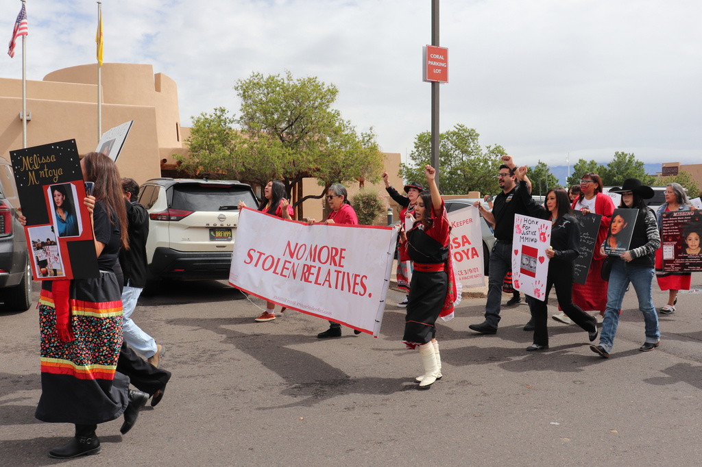 Demonstrators participate in a prayer walk to mark the national day of awareness for Missing and Murdered Indigenous Peoples in Albuquerque, N.M., Tuesday, May 5, 2026. (AP Photo/Savannah Peters)