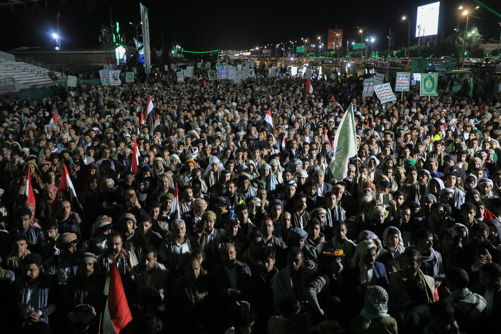 Supporters of Yemen's Houthi rebels gather during a rally organized to celebrate the group's capture of Mayun Island in the strategic Bab el-Mandeb Strait, in Houthi-controlled Sanaa, Yemen, Friday, Sept. 11, 2026. (AP Photo/Osamah Abdulrahman)