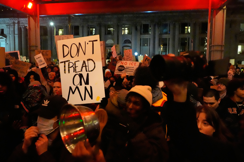 People participate in a protest and noise demonstration calling for an end to federal immigration enforcement operations in the city, Friday, Jan. 9, 2026, in Minneapolis. (AP Photo/Jen Golbeck)