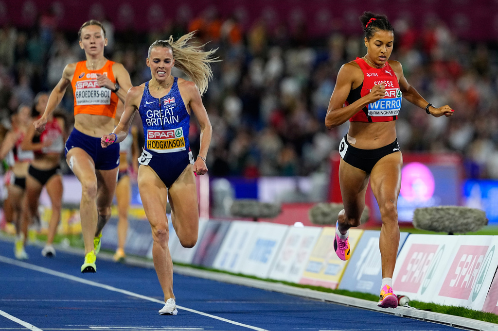 Audrey Werro of Switzerland crosses the line to win the gold medal ahead of Keely Hodgkinson of Britain and Femke Broeders-Bol of the Netherlands in the women's 800 meters final at the European Athletics Championships in Birmingham, England, Friday, Aug. 14, 2026. (AP Photo/Petr David Josek)
