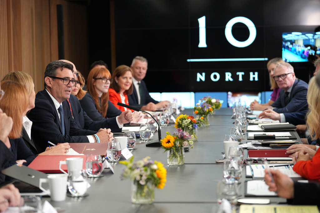 Britain's Prime Minister Andy Burnham, third left, holds a National Economic Council meeting at No 10 North at Heron House in Manchester, England. Friday July 24, 2026. (Christopher Furlong/Pool Photo via AP)