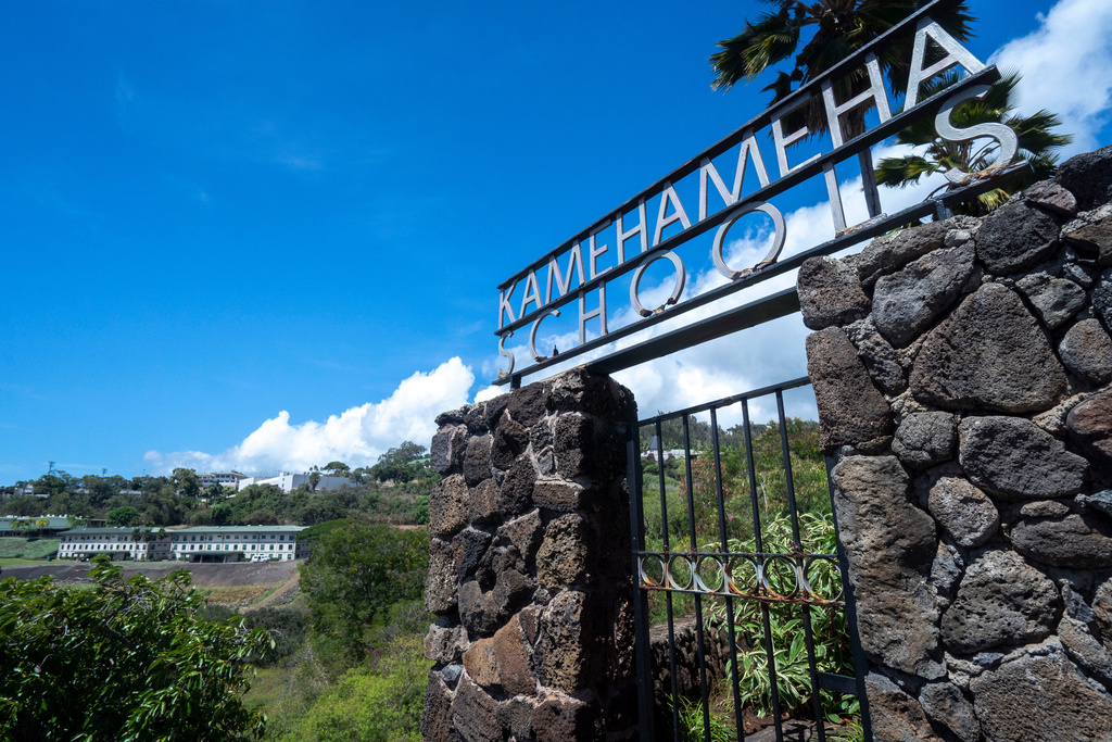 FILE - The entrance sign of Kamehameha Schools stands in front of the campus in Honolulu, Sept. 11, 2025. (AP Photo/Mengshin Lin, File)